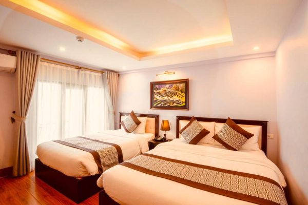 Không gian phòng ngủ thoải mái, đầy đủ tiện ích cho kỳ nghỉ ở Sapa