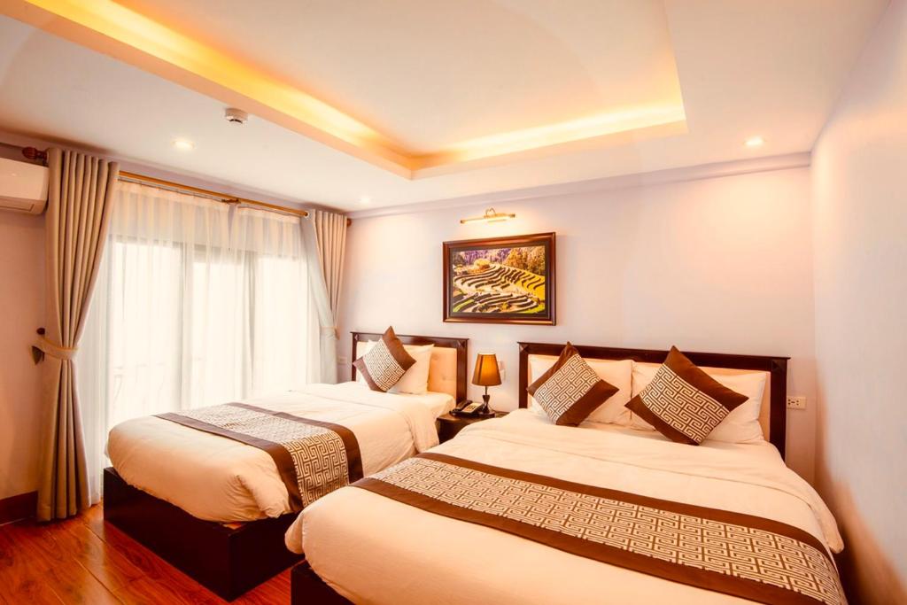 Không gian phòng ngủ thoải mái, đầy đủ tiện ích cho kỳ nghỉ ở Sapa